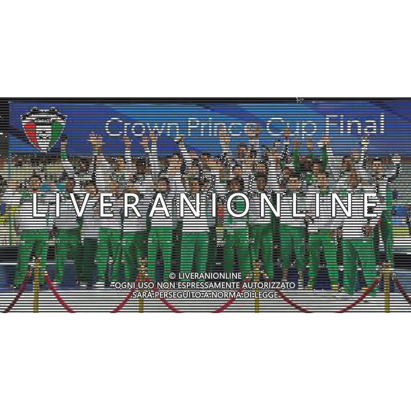 (111228) -- KUWAIT CITY, Dec. 28, 2011 () -- Players of Aarabi club celebrates after winning the Crown Prince Cup 2012 Final Football match against Qadsia club at Al Kuwait club Stadium in Kuwait City, capital of Kuwait, Dec. 27, 2011. Arabi won the match by penalty kicks 4-1. (/Noufal Ibrahim) ©photoshot/Agenzia Aldo Liverani Sas - ITALY ONLY - Qadsia di Fahad Al anssari - Arabi Abdulazziz al saleemi durante l\'incontro di calcio finale della Coppa della Corona del principe 2012 ad Al Kuwait Club Stadium di Kuwait City, capitale della Kuwait, 27 dicembre 2011. Arabi ha vinto la il trofeo ai calci di rigore 4-1.