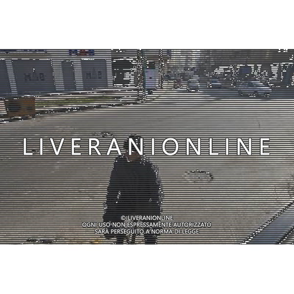 (111229) -- DAMASCUS, Dec. 29, 2011 () -- A man crosses the street on bicycle in Homs, Syria, Dec. 29, 2011. Mohammad Mustafa al-Dabi, the head of Arab League (AL) observer mission, told the private Addounia TV on Wednesday that the situation in Homs is \'placatory till now,\' and has unequivocally confessed the presence of \'gunmen\' in the city. (/Li Muzi) /photoshot/AG ALDO LIVERANI SAS - ITALY ONLY