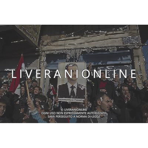 (111229) -- DAMASCUS, Dec. 29, 2011 () -- Syrians hold Syrian President Bashar al-Assad\'s photo in rally in support of the government in Homs, Syria, Dec. 29, 2011. Mohammad Mustafa al-Dabi, the head of Arab League (AL) observer mission, told the private Addounia TV on Wednesday that the situation in Homs is \'placatory till now,\' and has unequivocally confessed the presence of \'gunmen\' in the city. (/Li Muzi) /photoshot/AG ALDO LIVERANI SAS - ITALY ONLY