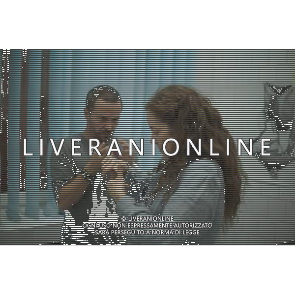Left to right: Director/co-writer/editor William Brent Bell discusses a scene with Suzan Crowley (as Maria) on the set of THE DEVIL INSIDE, from Insurge Pictures. © LFI/Photoshot - ag. aldo liverani sas italy only FILM: \' THE DEVIL INSIDE\'