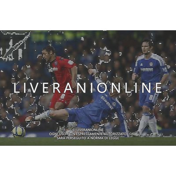 Portsmouth\'s Hayden Mullins is tackled by Chelsea\'s Fernando Torres Football - FA Challenge Cup Third Round - Chelsea v Portsmouth - Sun 08 Jan 2012 - Stamford Bridge - London © CameraSport - 43 Linden Ave. Countesthorpe. Leicester. England. LE8 5PG - Tel: +44 (0) 116 277 4147 - admin@camerasport.com - www.camerasport.com