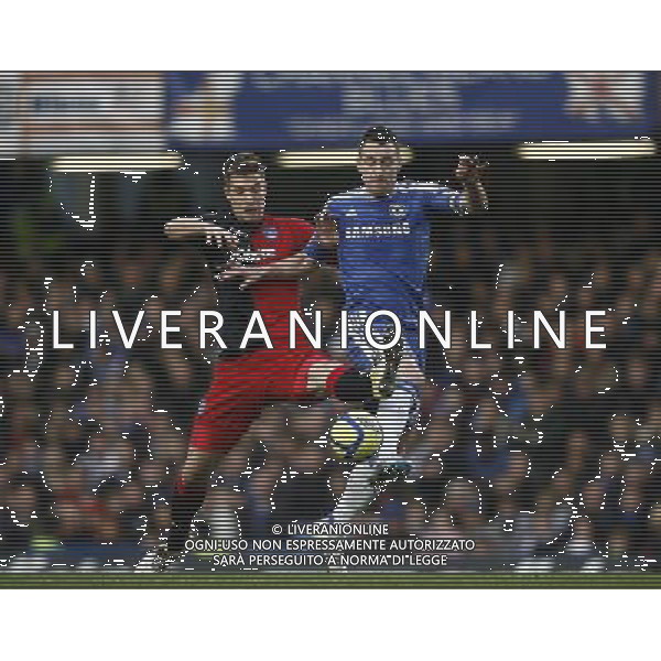 Portsmouth\'s Marko Futacs battles with Chelsea\'s John Terry Football - FA Challenge Cup Third Round - Chelsea v Portsmouth - Sun 08 Jan 2012 - Stamford Bridge - London © CameraSport - 43 Linden Ave. Countesthorpe. Leicester. England. LE8 5PG - Tel: +44 (0) 116 277 4147 - admin@camerasport.com - www.camerasport.com