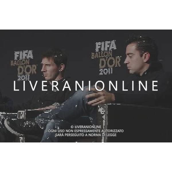 (120109) -- ZURICH, Jan. 9, 2012 () -- Lionel Messi of Argentina and Barcelona FC (L) and his teammate Xavi Hernandez of Spain, nominees for the FIFA Ballon d\'Or, attend a press conference ahead of the FIFA Ballon d\'Or Gala 2012 at the congress hall in Zurich, Switzerland, Jan. 9, 2012. (/Zhou Lei) ©PHOTOSHOT/Agenzia Aldo Liverani Sas - ITALY ONLY: ZURIGO - PREMIAZIONE \' PALLONE D\'ORO 2011\'