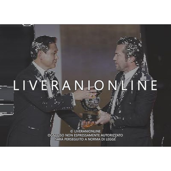 (120110) -- ZURICH, Jan. 10, 2012 () -- Norio Sasaki (L), coach of the Japanese women\'s national football team receives the FIFA Women\'s Football Coach of the Year Award from German football star Lothar Matthaeus during the FIFA Ballon d\'Or Gala 2011 in Zurich, Switzerland, Jan. 9, 2012. (/Zhou Lei) (jyc) ©PHOTOSHOT/Agenzia Aldo Liverani Sas - ITALY ONLY: ZURIGO - PREMIAZIONE \' PALLONE D\'ORO 2011\'