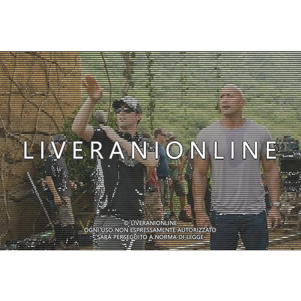 (L-r) Director BRAD PEYTON and DWAYNE JOHNSON on location during the filming of New Line Cinemas family adventure JOURNEY 2: THE MYSTERIOUS ISLAND, a Warner Bros. Pictures release. ©PHOTOSHOT/ALDO LIVERANI SAS - ITALY ONLY -