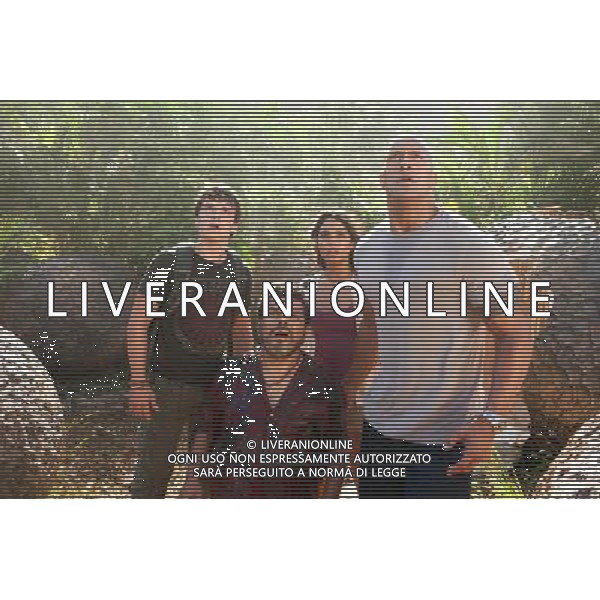 (L-r) JOSH HUTCHERSON as Sean, LUIS GUZMN as Gabato, VANESSA HUDGENS as Kailani, and DWAYNE JOHNSON as Hank in New Line Cinemas family adventure JOURNEY 2: THE MYSTERIOUS ISLAND, a Warner Bros. Pictures release. ©PHOTOSHOT/ALDO LIVERANI SAS - ITALY ONLY -