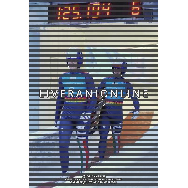 (120117) -- INNSBRUCK, Jan. 17, 2012 () -- Florian Gruber (L) and Simon Kainzwaldner of Italy walk on the track of Luge Doubles competition during Innsbruck 2012 Youth Olympic Games at Olympic Sliding Centre Innsbruck, Austria, Jan. 16, 2012. They won the gold medal of the event. (/Xu Liang) (yt) ©photoshot/Agenzia Aldo Liverani Sas - ITALY ONLY - Giochi Olimpici della Gioventu\' a Innsbruck, Austria, 16 Gennaio 2012.