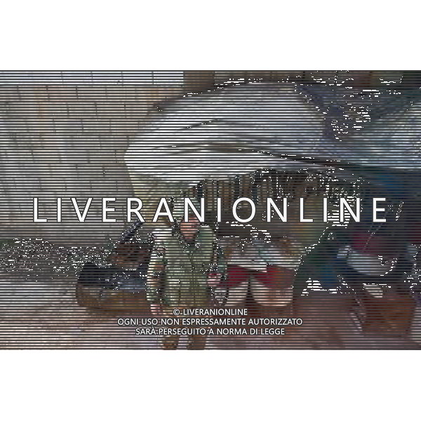 (120117) HOMS, Jan. 17, 2012 () A Syrian army soldier stands guard in the street in Homs, Syria, Jan. 16, 2012. A group of foreign journalists led by Syrian news authority entered Homs on Monday, five days after a group of foreign journalists were attacked by terrorists in the city. (/Li Muzi) (djj) ©PHOTOSHOT/ALDO LIVERANI SAS - ITALY ONLY -