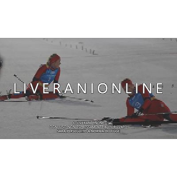 (120120) -- INNSBRUCK, Jan. 20, 2012 () -- Gold medalist Silje Theodorsen (L) of Norway lie on the ground with her teammate bronze medalist Linn Eriksen after the Cross country Skiing ladies\' sprint free event at the Innsbruck 2012 Youth Olympic Games in Innsbruck, Austria, Jan. 19, 2012. Silje Theodorsen won the gold medal with 1 minutes 57.4 seconds. (/Bai Xuefei)(dlq) ITALY ONLY - Austria: Giochi Olimpici della Gioventu\' a Innsbruck