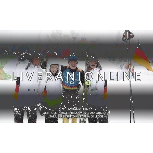 (120121) -- INNSBRUCK, Jan. 21, 2012 () -- Gold medalists Maximilian Janke, Franziska Preuss, Christian Stiebritz and Victoria Carl of Team Germany celebrate after winning Cross country skiing biathlon mixed relay at Seefeld Arena at the 1st Innsbruck 2012 Youth Olympic Games in Innsbruck, Austria, Jan. 21, 2012. Germany won the gold medal with 1 hour 4 minutes and 23.4 seconds. (/Bai Xuefei) ©photoshot/Agenzia Aldo Liverani Sas - ITALY ONLY - Austria: Giochi Olimpici della Gioventu\' a Innsbruck