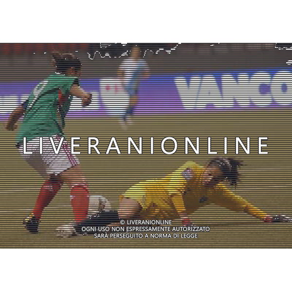 (120121) -- VANCOUVER, Jan. 21, 2012 () -- Maribel Dominguez (L) of Mexico evades Guatemala\'s goalkeeper Maricruz Lemus during their match at the 2012 CONCACAF Women\'s Olympic Qualifying Soccer Tournament in Vancouver, Canada, Jan. 20, 2012. Mexico defeated Guatemala 5-0. (/Sergei Bachlakov) ©photoshot/Agenzia Aldo Liverani Sas - ITALY ONLY - Partita di qualificazione del torneo olimpico di calcio femminile 2012 CONCACAF a Vancouver, Canada 20 gennaio 2012.