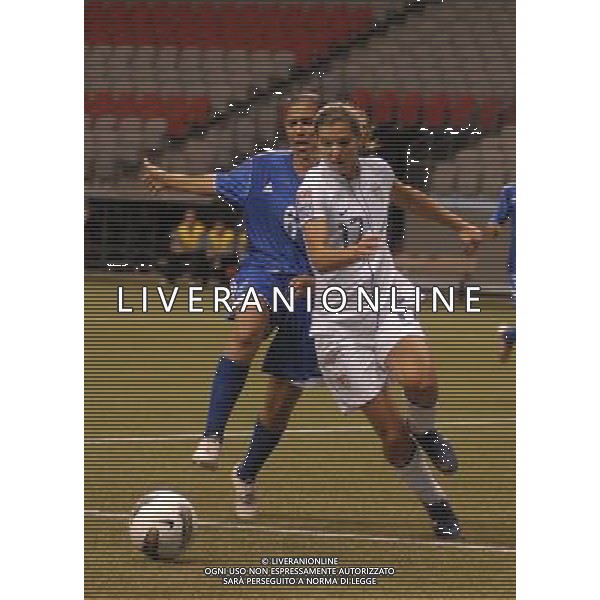 (120122) -- VANCOUVER, Jan. 22, 2012 () -- Tobin Heath (R) of the United States vies the ball with Sencion Lopez of Dominican Republic during their match at the Day 2 of 2012 CONCACAF Women\'s Olympic Qualifying Soccer Tournament in Vancouver, Canada, Jan. 20, 2012. The United States won 14-0. (/Sergei Bachlakov) (jyc) ©photoshot/Agenzia Aldo Liverani Sas - ITALY ONLY - Partita di qualificazione del torneo olimpico di calcio femminile 2012 CONCACAF a Vancouver, Canada 20 gennaio 2012.