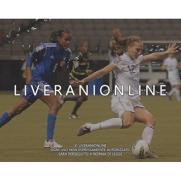 (120122) -- VANCOUVER, Jan. 22, 2012 () -- Lauren Cheney (R) of the United States vies the ball with Ana Diaz of Dominican Republic during their match at the Day 2 of 2012 CONCACAF Women\'s Olympic Qualifying Soccer Tournament in Vancouver, Canada, Jan. 20, 2012. The United States won 14-0. (/Sergei Bachlakov) (jyc) ©photoshot/Agenzia Aldo Liverani Sas - ITALY ONLY - Partita di qualificazione del torneo olimpico di calcio femminile 2012 CONCACAF a Vancouver, Canada 20 gennaio 2012.