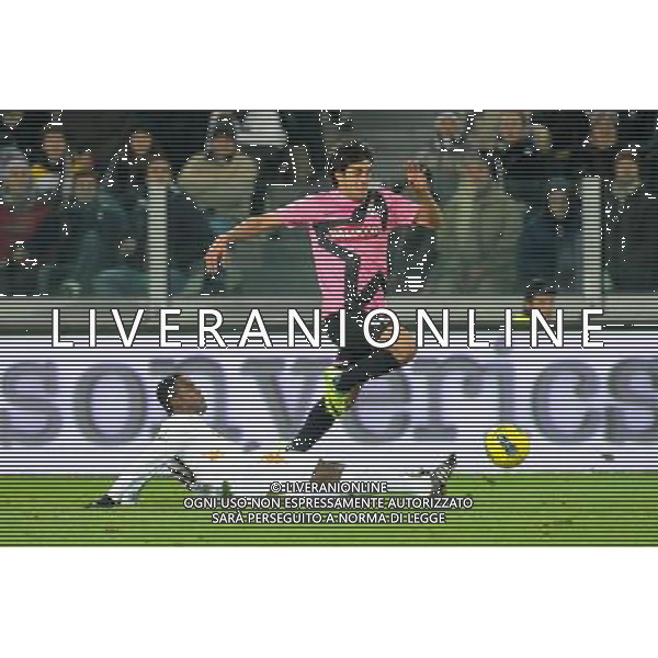 Coppa Italia TIM - Quarti di finale Torino 24-01-2012 Juventus - Roma nella foto: Marcelo Estigarribia (Juventus) salta Fabio Simplicio (Roma) foto Roberto Garavaglia - ag. Aldo Liverani sas