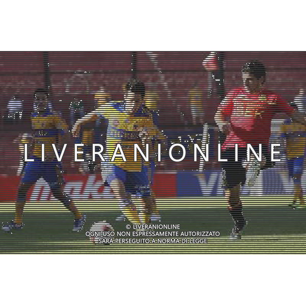 (120126) SANTIAGO, Jan. 25, 2012 () Gonzalo Barriga (R) of Union Espanola vies with Fernando Navarro (C) of Tigres during the Copa Libertadores soccer match in Santiago, Chile, on Jan. 25, 2012. (/Victor Rojas) - Xinhua/Photoshot - ag. aldo liverani sas italy only CILE- CALCIO: COPPA LIBERTADORES ( partita Union Espanola vs Tigres) a Santiago