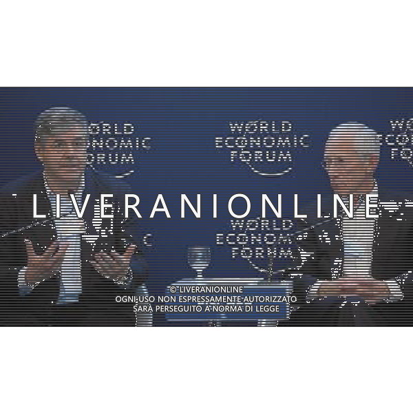 DAVOS/SWITZERLAND, 28JAN12 - Josef Ackermann (L), Chairman of the Management Board and Group Executive Committee, Deutsche Bank, Germany; Foundation Board Member and Stanley Fischer,Governor of the Central Bank of Israel, are captured during the session \'Trust and the Social Contract\' at the Annual Meeting 2012 of the World Economic Forum at the congress centre in Davos, Switzerland, January 28, 2012. AG ALDO LIVERANI S A S ONLY ITALY