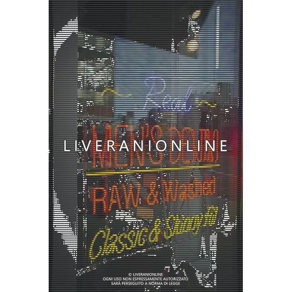 A store in New York advertises its denim with a neon sign in the window, seen on Saturday, January 28, 2012. © RICHARD B. LEVINE - photoshot - ag. aldo liverani sas italy only VEDUTE DI NEW YORK