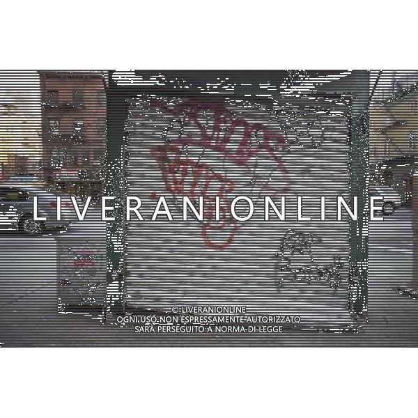 A graffiti covered closed newsstand in the Chelsea neighborhood of New York is seen on Saturday, January 28, 2012. © RICHARD B. LEVINE - photoshot - ag. aldo liverani sas italy only VEDUTE DI NEW YORK SARACINESCA ROTTA