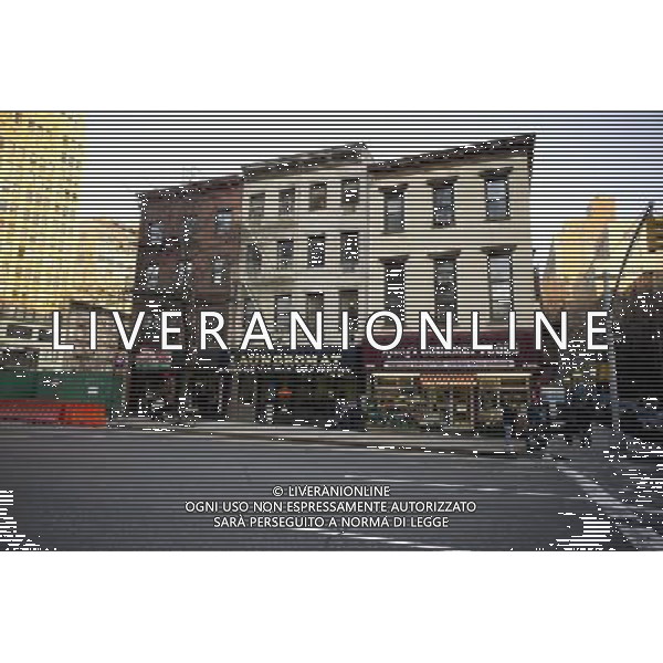 Tenements on Eighth Avenue in the New York neighborhood of Chelsea with retail on the first floor, seen on Saturday, January 28, 2012. © RICHARD B. LEVINE - photoshot - ag. aldo liverani sas italy only VEDUTE DI NEW YORK