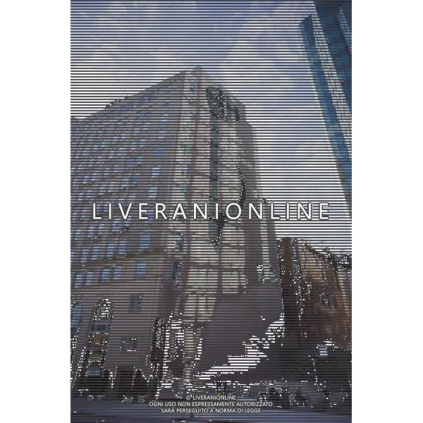 The Carl Fischer music publishers sign and clock on the side of 62 Cooper Square in the East Village neighborhood of New York is seen on Saturday, January 28, 2012. The clock no longer functions and the building was converted to condos in 2001. © RICHARD B. LEVINE - photoshot - ag. aldo liverani sas italy only VEDUTE DI NEW YORK