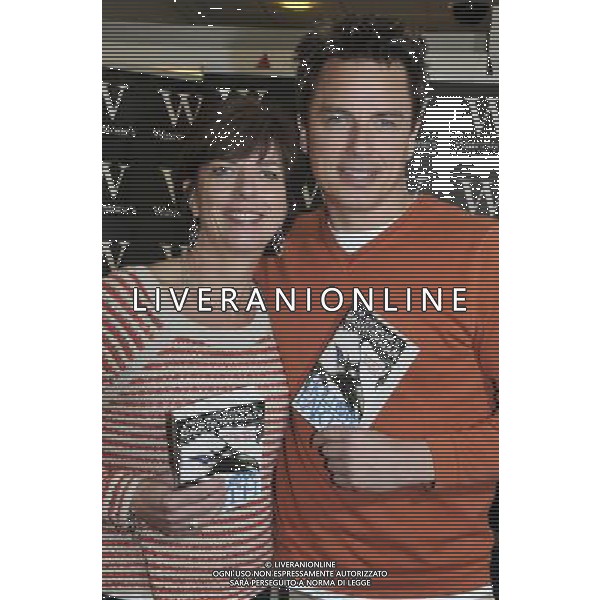 John Barrowman and his sister Carole E Barrowman at a signing of their first children\'s book \'Hollow Earth\' at Waterstones, Bluewater Shopping Centre, Greenhithe, Kent on Saturday. 4 February 2012. © Sue Andrews - PHOTOSHOT - AG. ALDO LIVERANI SAS ITALY ONLY