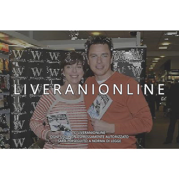 John Barrowman and his sister Carole E Barrowman at a signing of their first children\'s book \'Hollow Earth\' at Waterstones, Bluewater Shopping Centre, Greenhithe, Kent on Saturday. 4 February 2012. © Sue Andrews - PHOTOSHOT - AG. ALDO LIVERANI SAS ITALY ONLY