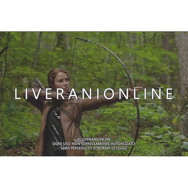 Jennifer Lawrence stars as \'Katniss Everdeen\' in THE HUNGER GAMES. AG ALDO LIVERANI S A S ONLY ITALY