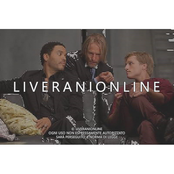 Cinna (Lenny Kravitz, left), Haymitch Abernathy (Woody Harrelson, center) and Josh Hutcherson (right) in THE HUNGER GAMES. AG ALDO LIVERANI S A S ONLY ITALY