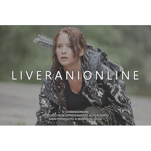 Jennifer Lawrence stars as \'Katniss Everdeen\' in THE HUNGER GAMES. AG ALDO LIVERANI S A S ONLY ITALY