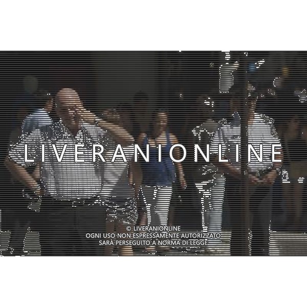 (120208) -- BUENOS AIRES, Feb. 8, 2012 () -- People walk on a street in Buenos Aires, capital of Argentina, Feb. 7, 2012. Argentina suffered a heat wave on Feb. 7, with the highest temperature of Buenos Aires surpassing 40 degrees Celsius and that of La Rioja surpassing 50 degrees Celsius. (/Martin Zabala) (mx) SITUAZIONI CALDO BUENOS AIRES ARGENTINA ©AG ALDO LIVERANI SAS - ITALY ONLY