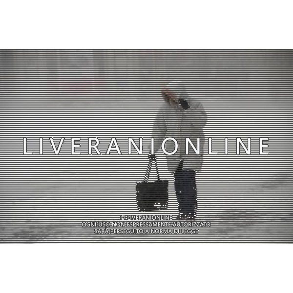 (120207) -- ROUSSE, Feb. 8, 2012 () -- A woman walks in snowstorm in Rousse, Bulgaria, Feb. 7, 2012. Roads out of Rousse were closed Tuesday, as a snowstorm hit Rousse.(/bta)