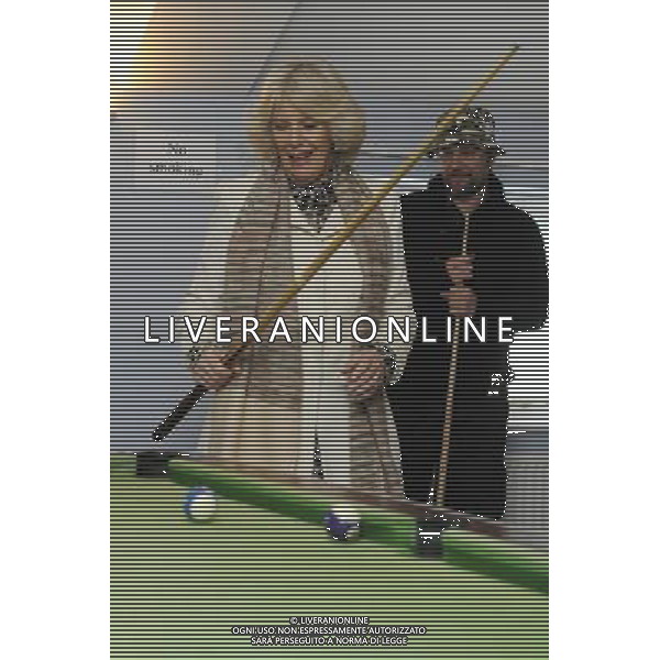 The Duchess of Cornwall today visited \'Emmaus Cambridge\', The formerly homeless residents, known as Companions, live on-site at the Emmaus Community in Landbeach. The Duchess visited all areas and facilities of the Community, including the electrical workshop, furniture store and coffee shop.Companions living in Emmaus Communities sign offunemployment benefits and work full time at the business of the community which is collecting, refurbishing and selling donated household goods. The Duchess of Cornwall is Patron of Emmaus UK Photo Shows; The Duchess of Cornwall playing pool with some of the Companions © David Wimsett - photoshot - ag. aldo liverani sas italy only REALI INGHILTERRA - CAMILLA, DUCHESSA DI CORNOVAGLIA, MENTRE GIOCA A BILIARDO DURANTE LA SUA VISITA A CAMBRIDGE