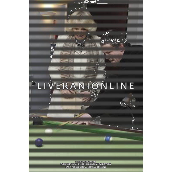 The Duchess of Cornwall today visited \'Emmaus Cambridge\', The formerly homeless residents, known as Companions, live on-site at the Emmaus Community in Landbeach. The Duchess visited all areas and facilities of the Community, including the electrical workshop, furniture store and coffee shop.Companions living in Emmaus Communities sign offunemployment benefits and work full time at the business of the community which is collecting, refurbishing and selling donated household goods. The Duchess of Cornwall is Patron of Emmaus UK Photo Shows; The Duchess of Cornwall playing pool with some of the Companions © David Wimsett - photoshot - ag. aldo liverani sas italy only REALI INGHILTERRA - CAMILLA, DUCHESSA DI CORNOVAGLIA, MENTRE GIOCA A BILIARDO DURANTE LA SUA VISITA A CAMBRIDGE