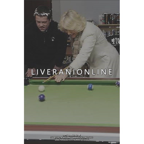 The Duchess of Cornwall today visited \'Emmaus Cambridge\', The formerly homeless residents, known as Companions, live on-site at the Emmaus Community in Landbeach. The Duchess visited all areas and facilities of the Community, including the electrical workshop, furniture store and coffee shop.Companions living in Emmaus Communities sign offunemployment benefits and work full time at the business of the community which is collecting, refurbishing and selling donated household goods. The Duchess of Cornwall is Patron of Emmaus UK Photo Shows; The Duchess of Cornwall playing pool with some of the Companions © David Wimsett - photoshot - ag. aldo liverani sas italy only REALI INGHILTERRA - CAMILLA, DUCHESSA DI CORNOVAGLIA, MENTRE GIOCA A BILIARDO DURANTE LA SUA VISITA A CAMBRIDGE