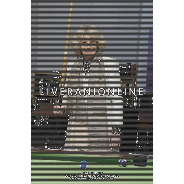 The Duchess of Cornwall today visited \'Emmaus Cambridge\', The formerly homeless residents, known as Companions, live on-site at the Emmaus Community in Landbeach. The Duchess visited all areas and facilities of the Community, including the electrical workshop, furniture store and coffee shop.Companions living in Emmaus Communities sign offunemployment benefits and work full time at the business of the community which is collecting, refurbishing and selling donated household goods. The Duchess of Cornwall is Patron of Emmaus UK Photo Shows; The Duchess of Cornwall playing pool with some of the Companions © David Wimsett - photoshot - ag. aldo liverani sas italy only REALI INGHILTERRA - CAMILLA, DUCHESSA DI CORNOVAGLIA, MENTRE GIOCA A BILIARDO DURANTE LA SUA VISITA A CAMBRIDGE