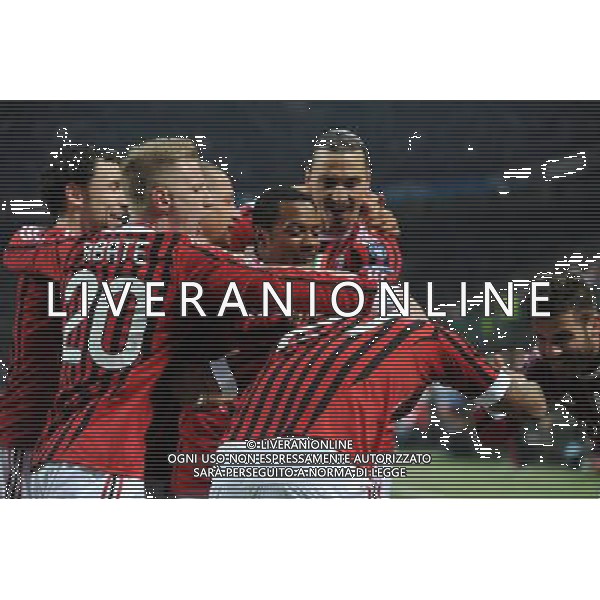 UEFA Champions League - Ottavi di finale gara di andata Milano 15-02-2012 Milan - Arsenal nella foto: abbracci esultanza dopo il gol di prince Boateng del 1 a 0 foto Roberto Garavaglia - ag. Aldo Liverani sas