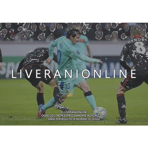 (120215) -- LEVERKUSEN, Feb. 15, 2012 () -- Lionel Messi (C) of Barcelona vies with Lars Bender (R) and Daniel Schwaab (L) of Leverkusen during first round of 1/8 final of Champions League football match between Bayer Leverkusen and FC Barcelona in Leverkusen, Germany, February 14, 2012. FC Barcelona won 3:1. (/Uwe Kraft) - Xinhua/Photoshot - ag. aldo liverani sas italy only GERMANIA - CALCIO: OTTAVI DI FINALE CHAMPIONS LEAGUE. PARTITA: BAYER LEVERKUSEN vs BARCELLONA