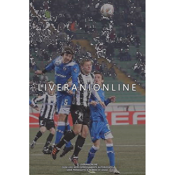 UDINE 16/02/2012 UEFA EUROPA LEAGUE 2011/2012 UDINESE vs PAOK NELLA FOTO: ALMEN ABDI E PABLO GARCIA FOTO PAOLA GARBUIO/AG.ALDO LIVERANI