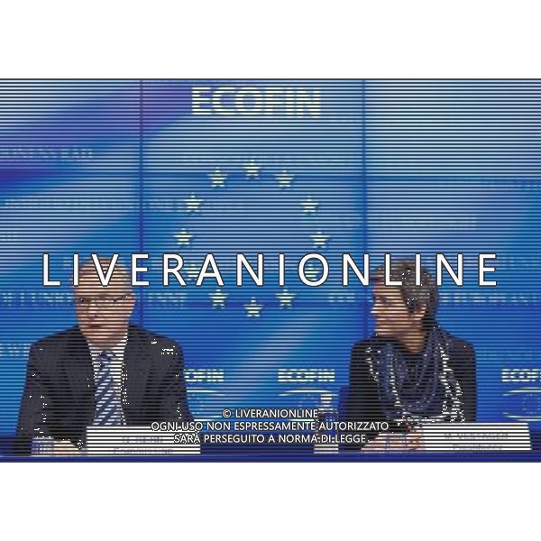 (120221) -- BRUSSELS, Feb. 21, 2012 () -- European Commissioner for Economic and Monetary Affairs Olli Rehn(L) and Danish Economy Minister Margrethe Vestager, whose country currently holds the rotating Presidency of EU, attend a news conference at the end of an ECOFIN meeting at the EU Headquarters in Brussels, capital of Belgium, on Feb. 21, 2012. (/Thierry Monasse) (yy) - Xinhua/Photoshot - ag. aldo liverani sas italy only