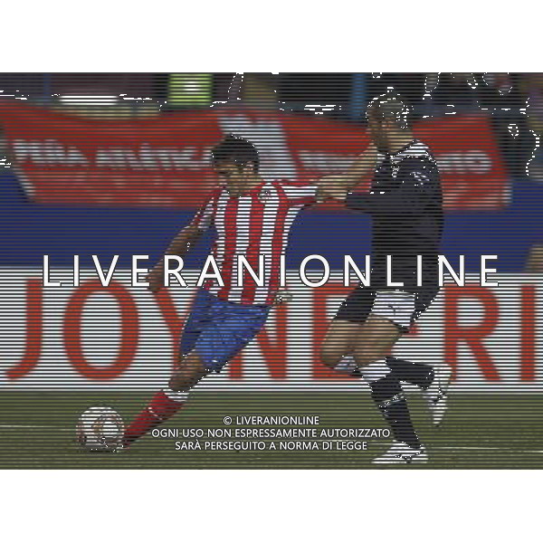 Atletico de Madrid\'s Eduardo Salvio (l) and Lazio\'s Andre Dias during Europa League match.February 23,2012. (ALTERPHOTOS/Acero) /AG ALDO LIVERANI SAS - ITALY ONLY -