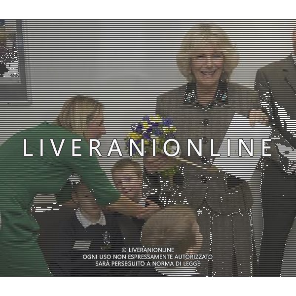 The Duchess of Cornwall opened the new Dyson Centre for Neonatal Intensive Care, (NICU) Royal United Hospital Bath NHS Trust, Combe Park, Bath THE DUCHESS HOLDS UP A PICTURE THET THE TRIPLETS DREW OF HER . ©