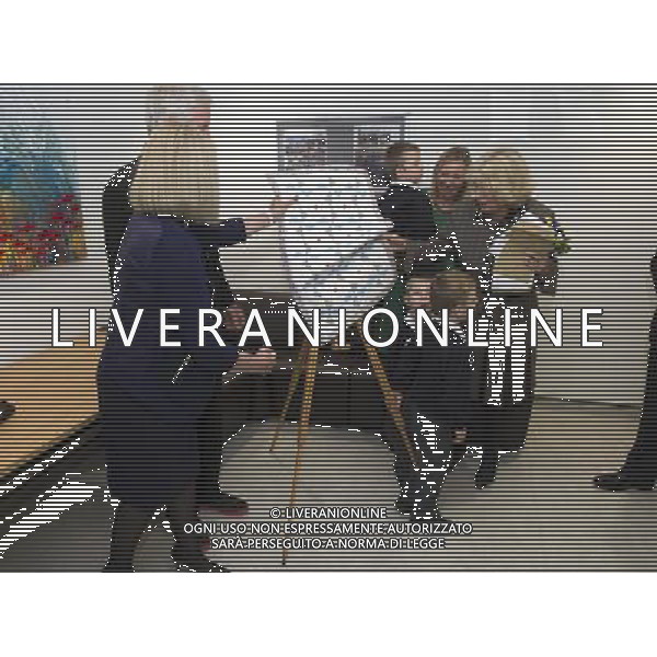The Duchess of Cornwall opened the new Dyson Centre for Neonatal Intensive Care, (NICU) Royal United Hospital Bath NHS Trust, Combe Park, .ONE OF THE TRIPLETS PULLS OVER THE EASEL CAMILLA AND LADY JAMES DYSON GRAB THE EASEL HOLDING THE HOSPITAL PLAQUE WAITING TO BE UNVIELED ©