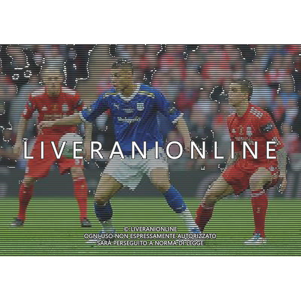 Cardiff City\'s Rudy Gestede is closed down by Liverpool\'s Daniel Agger and Martin Skrtel Football - Carling Cup Final - Cardiff City v Liverpool - Sunday 26 February 2012 - Wembley Stadium - London å© CameraSport - 43 Linden Ave. Countesthorpe. Leicester. England. LE8 5PG - Tel: +44 (0) 116 277 4147 - admin@camerasport.com - www.camerasport.com AG ALDO LIVERANI S A S ONLY ITALY