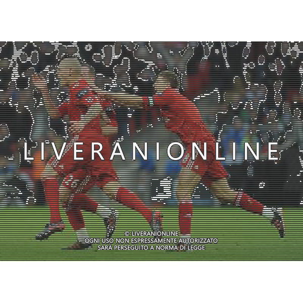 Liverpool\'s Martin Skrtel celebrates scoring his sides equalising goal to make the score with team-mate Steven Gerrard and Charlie Adam Football - Carling Cup Final - Cardiff City v Liverpool - Sunday 26 February 2012 - Wembley Stadium - London å© CameraSport - 43 Linden Ave. Countesthorpe. Leicester. England. LE8 5PG - Tel: +44 (0) 116 277 4147 - admin@camerasport.com - www.camerasport.com AG ALDO LIVERANI S A S ONLY ITALY