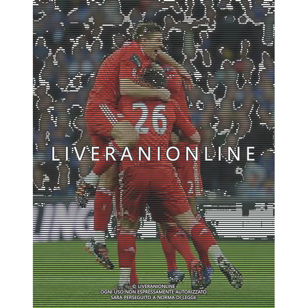 Liverpool\'s Steven Gerrard celebrates Martin Skrtel\'s equalising goal with team-mate\'s Charlie Adam Football - Carling Cup Final - Cardiff City v Liverpool - Sunday 26 February 2012 - Wembley Stadium - London å© CameraSport - 43 Linden Ave. Countesthorpe. Leicester. England. LE8 5PG - Tel: +44 (0) 116 277 4147 - admin@camerasport.com - www.camerasport.com AG ALDO LIVERANI S A S ONLY ITALY