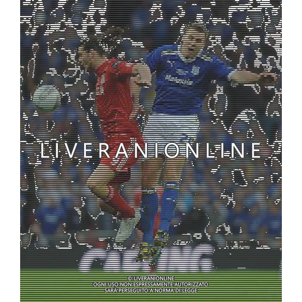 Liverpool\'s Andy Carroll and Cardiff City\'s Ben Turner clash in the air Football - Carling Cup Final - Cardiff City v Liverpool - Sunday 26 February 2012 - Wembley Stadium - London å© CameraSport - 43 Linden Ave. Countesthorpe. Leicester. England. LE8 5PG - Tel: +44 (0) 116 277 4147 - admin@camerasport.com - www.camerasport.com AG ALDO LIVERANI S A S ONLY ITALY