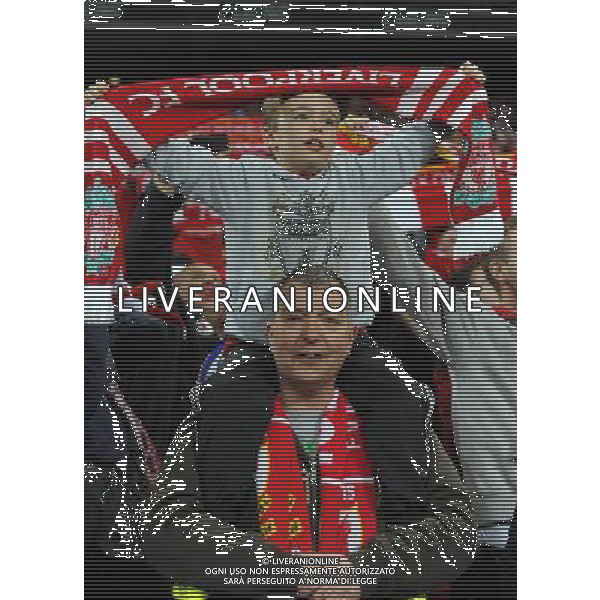 Father and Son Liverpool fans celebrate winning the Carling league cup Football - Carling Cup Final - Cardiff City v Liverpool - Sunday 26 February 2012 - Wembley Stadium - London å© CameraSport - 43 Linden Ave. Countesthorpe. Leicester. England. LE8 5PG - Tel: +44 (0) 116 277 4147 - admin@camerasport.com - www.camerasport.com AG ALDO LIVERANI S A S ONLY ITALY