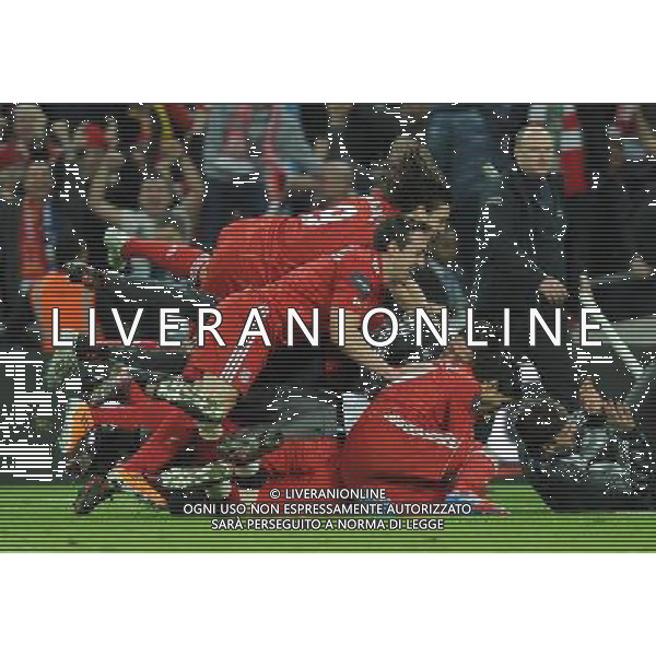 Liverpool players dive on Liverpool\'s Jose Manuel Reina (not in frame) in celebration of winning the Carling League Cup Football - Carling Cup Final - Cardiff City v Liverpool - Sunday 26 February 2012 - Wembley Stadium - London å© CameraSport - 43 Linden Ave. Countesthorpe. Leicester. England. LE8 5PG - Tel: +44 (0) 116 277 4147 - admin@camerasport.com - www.camerasport.com AG ALDO LIVERANI S A S ONLY ITALY