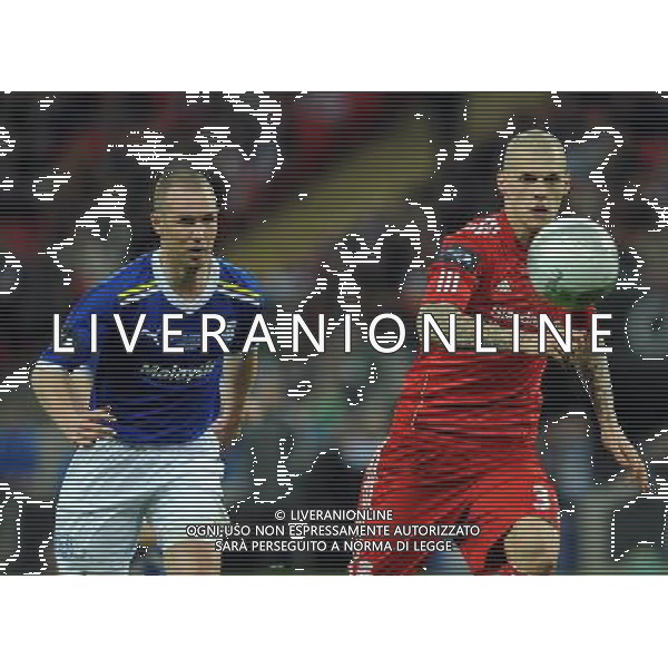 Liverpool\'s Martin Skrtel is closely watched by Cardiff City\'s Kenny Miller Football - Carling Cup Final - Cardiff City v Liverpool - Sunday 26 February 2012 - Wembley Stadium - London å© CameraSport - 43 Linden Ave. Countesthorpe. Leicester. England. LE8 5PG - Tel: +44 (0) 116 277 4147 - admin@camerasport.com - www.camerasport.com AG ALDO LIVERANI S A S ONLY ITALY