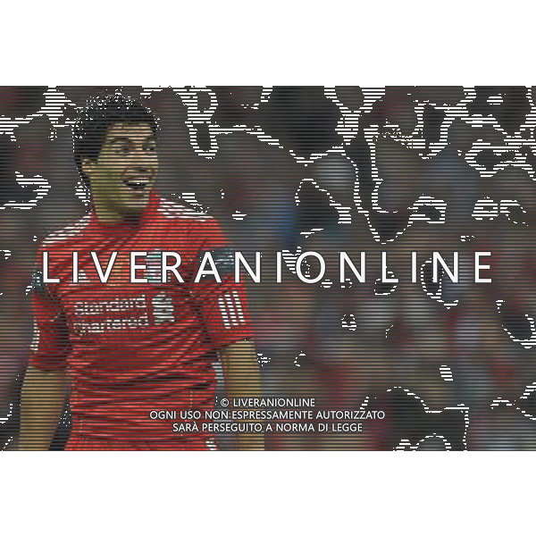 Liverpool\'s Luis Suarez laughs at the lines man decision Football - Carling Cup Final - Cardiff City v Liverpool - Sunday 26 February 2012 - Wembley Stadium - London å© CameraSport - 43 Linden Ave. Countesthorpe. Leicester. England. LE8 5PG - Tel: +44 (0) 116 277 4147 - admin@camerasport.com - www.camerasport.com AG ALDO LIVERANI S A S ONLY ITALY